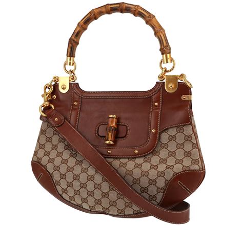 borsa gucci marrone scuro|Mini borsa a spalla Bamboo in pelle marrone .